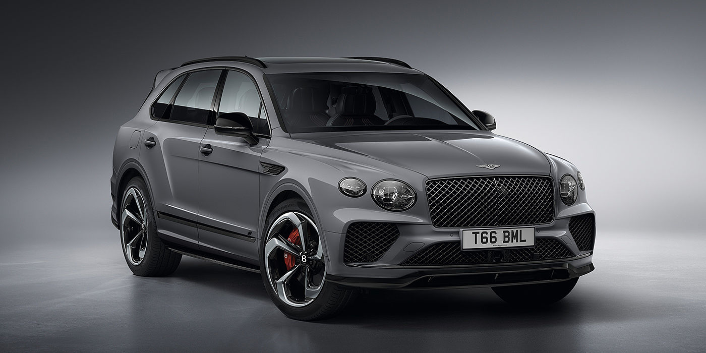 Bentley Katowice Bentley Bentayga S in Cambrian Grey paint front three - quarter view with dark chrome matrix grille and featuring elliptical LED matrix headlights. 