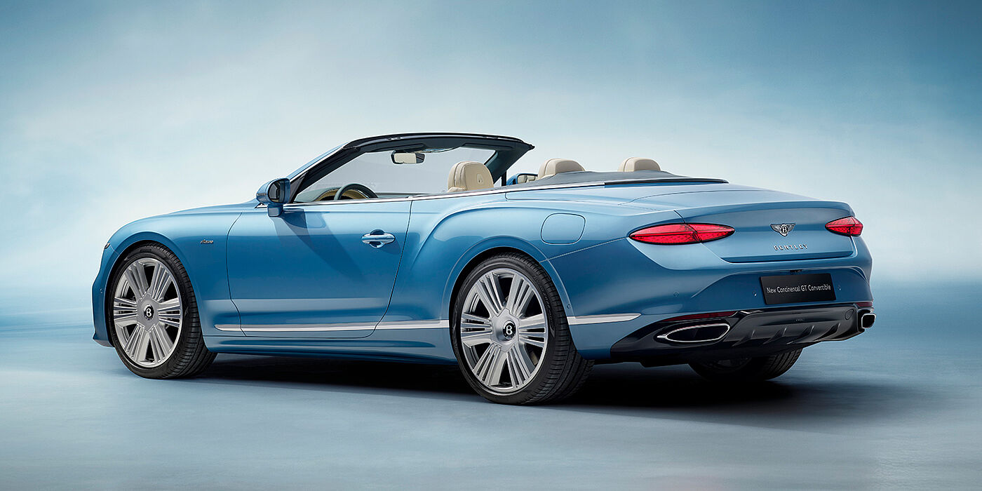 Bentley Katowice New Bentley Continental GTC Azure convertible rear view in Light Windsor blue paint with 22 inch ten spoke wheels and chrome exterior details