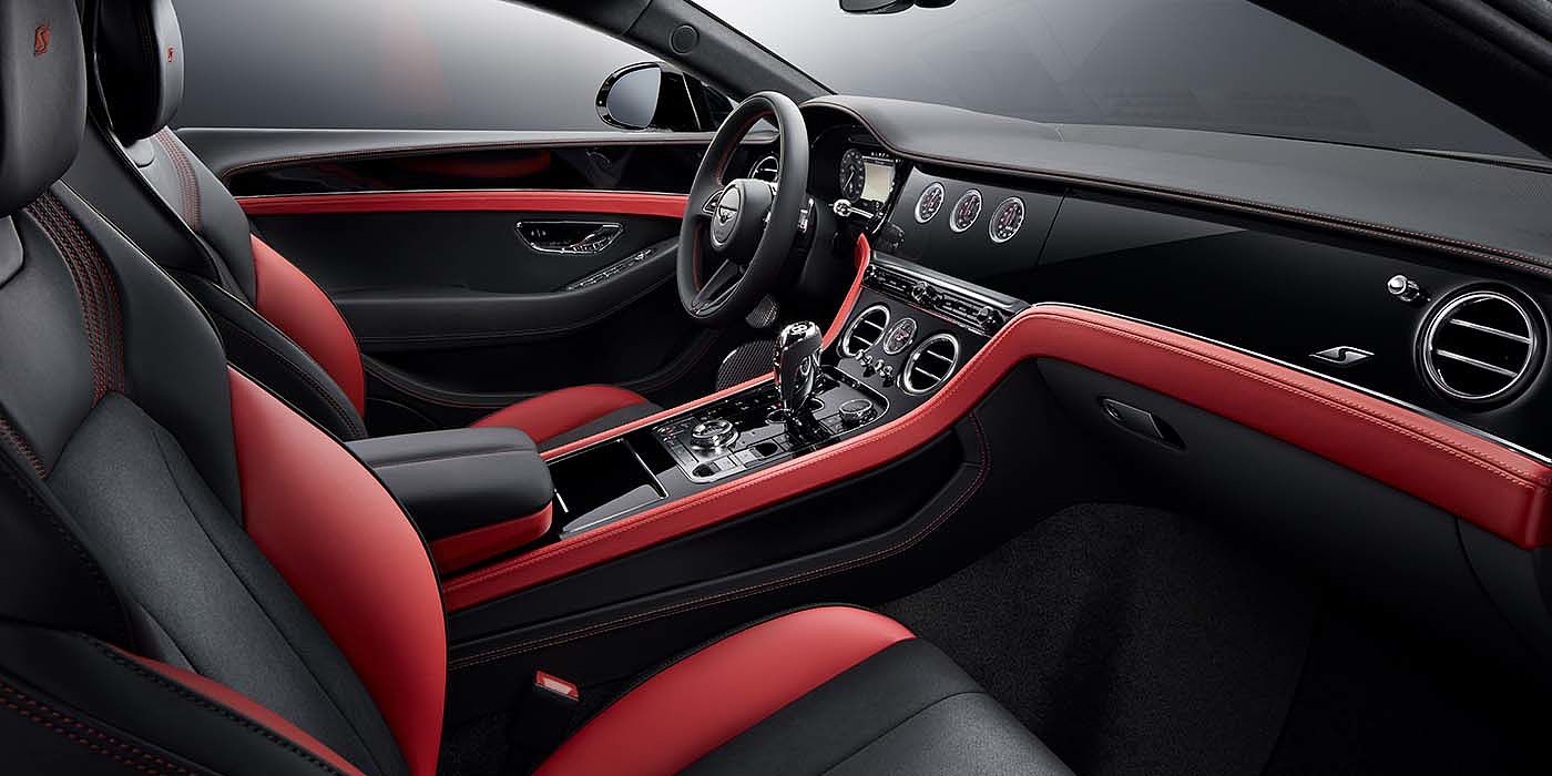 Bentley Katowice Bentley Continental GT S coupe front interior in Beluga black and Hotspur red hide with high gloss Carbon Fibre veneer