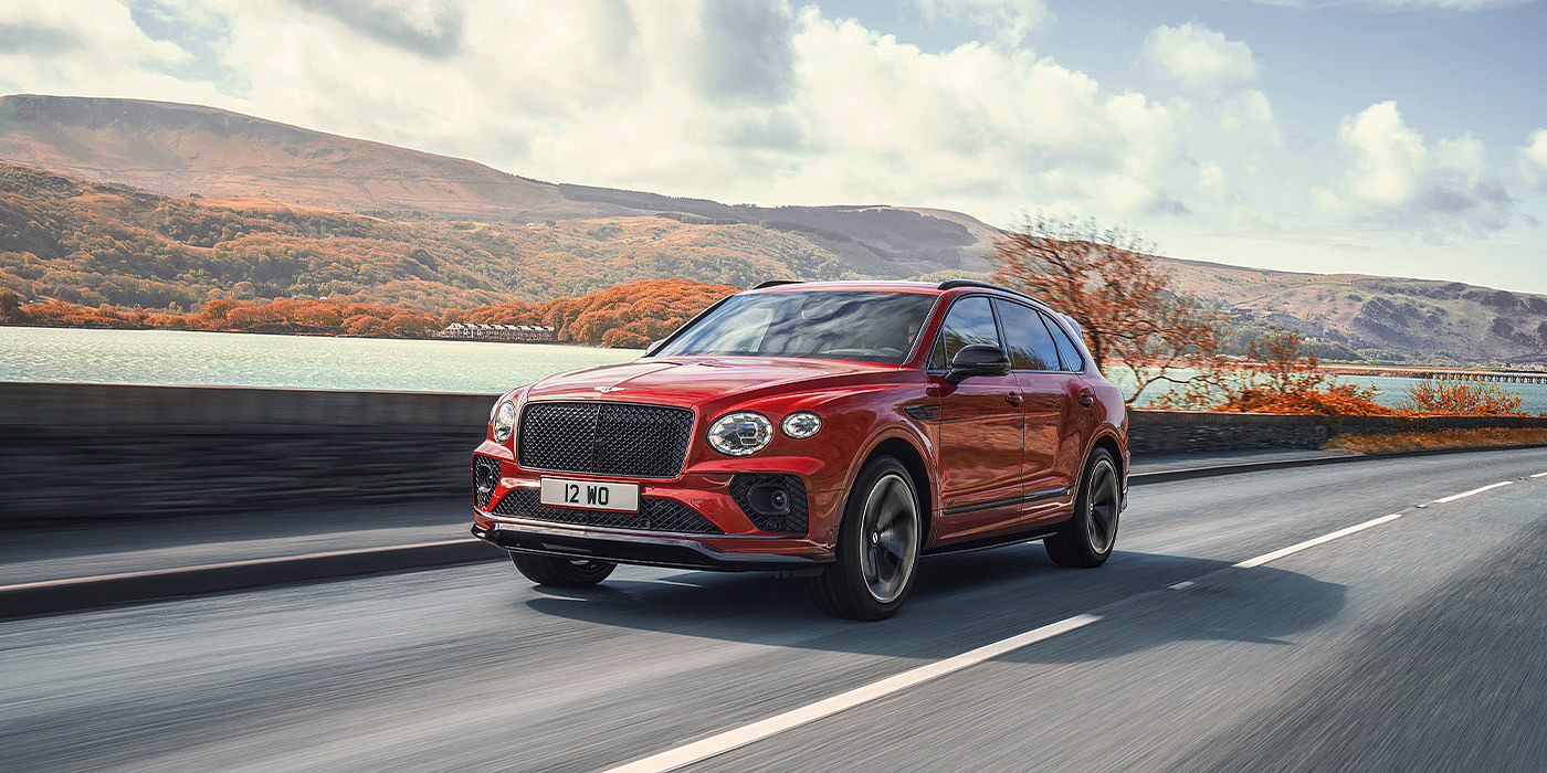 Bentley Katowice Bentley Bentayga S SUV in Candy Red paint front 34 dynamic