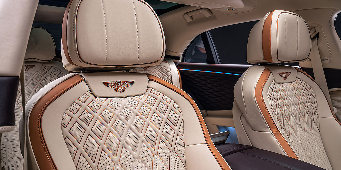 Bentley Katowice Bentley Flying Spur Odyssean sedan rear seat detail with Diamond quilting and Linen and Burnt Oak hides