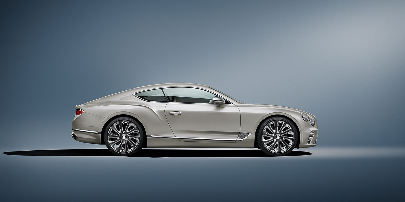 Bentley Katowice Bentley Continental GT Mulliner coupe in White Sand paint front 34