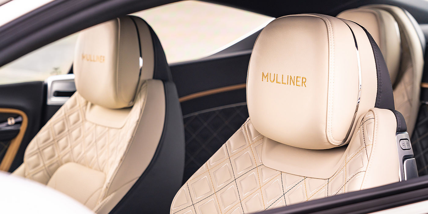 Bentley Katowice Bentley Continental GT Mulliner coupe seat detail in Beluga black and Linen hide