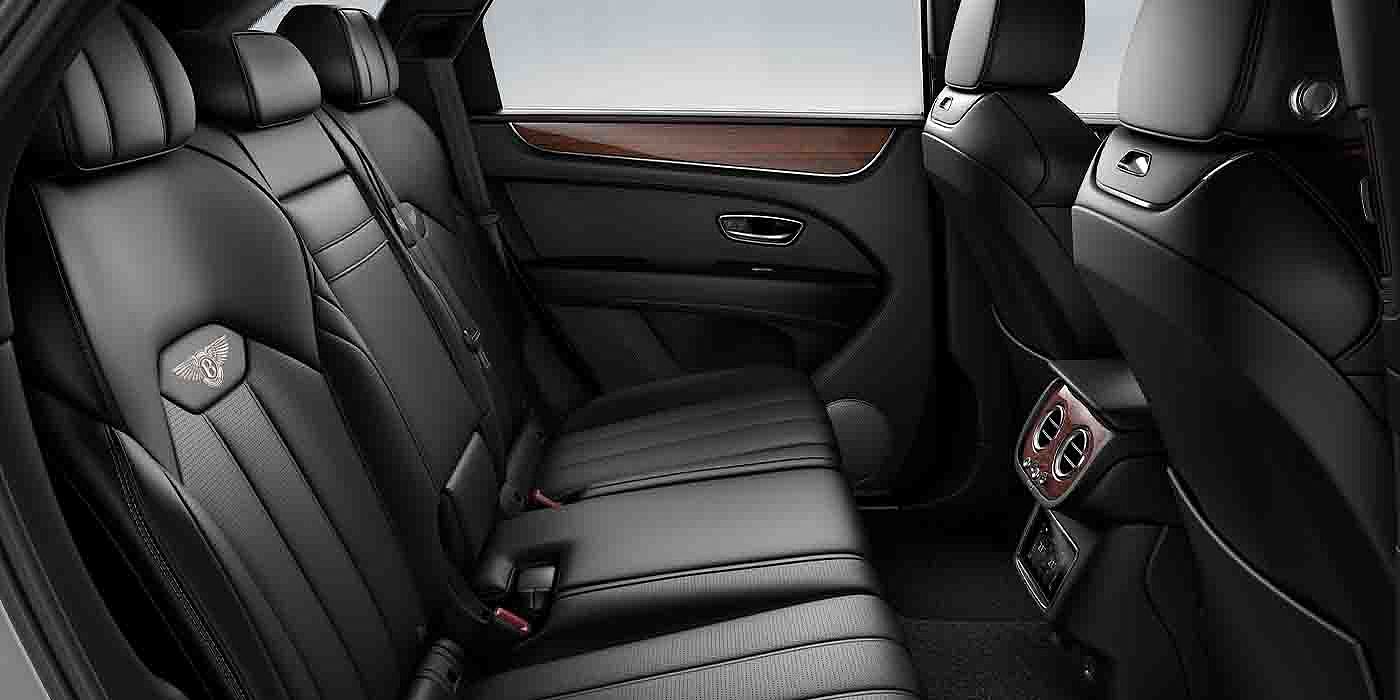 Bentley Katowice Bentley Bentayga EWB interior view for rear passengers with Beluga black hide.