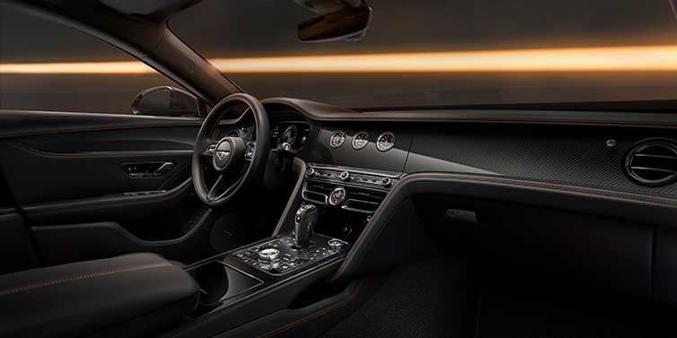 Bentley Katowice Bentley Flying Spur Black Edition sedan front interior in Beluga black hide with High Gloss Carbon Fibre veneer